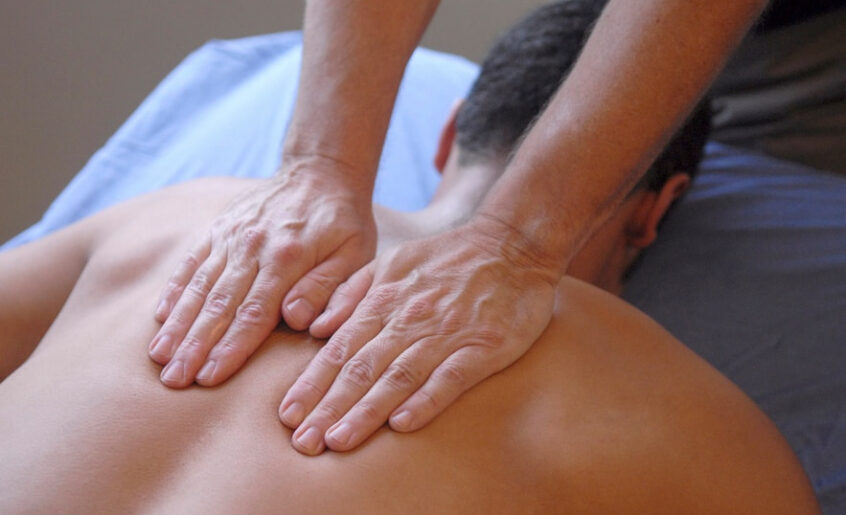 Man getting massage with oil